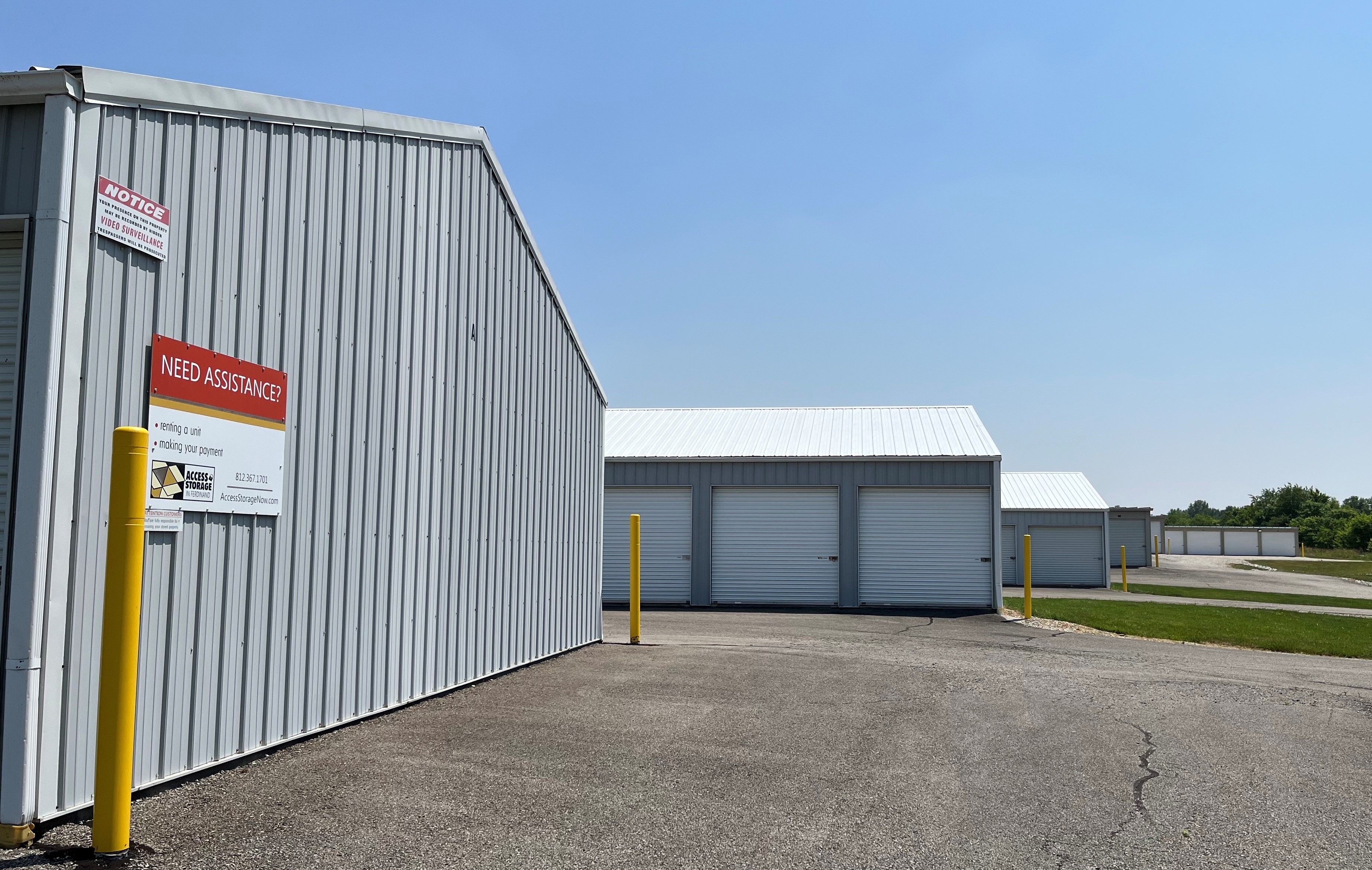 Mississippi St Access Storage offering large, white-door units and enclosed parking, complemented by broad driveways.